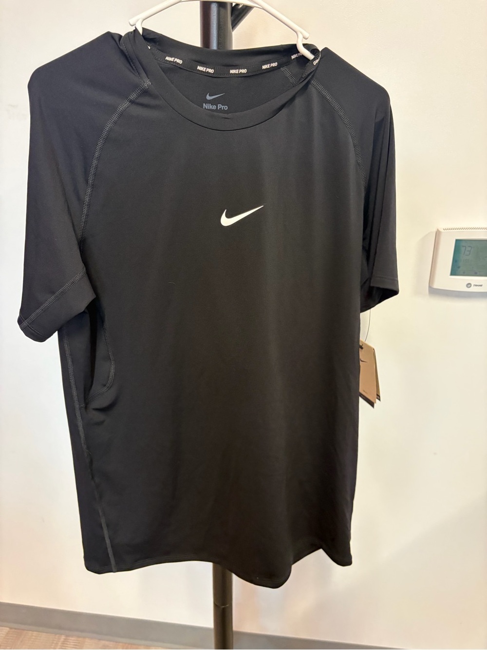 Nike Black Short-Sleeve Performance Tee with White Swoosh